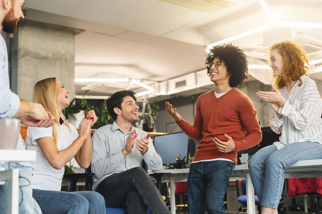 creative-team-enjoying-communication-in-modern-off-UCJ6X4R.jpg
