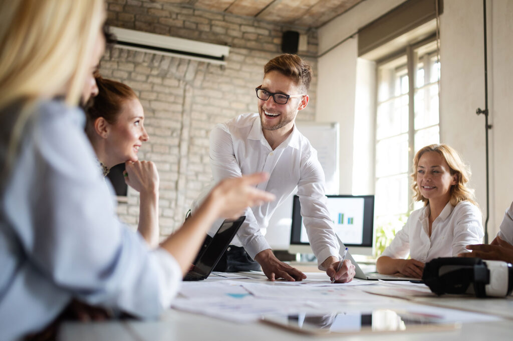 happy-creative-team-in-office-business-startup-des-K9DEN3B.jpg